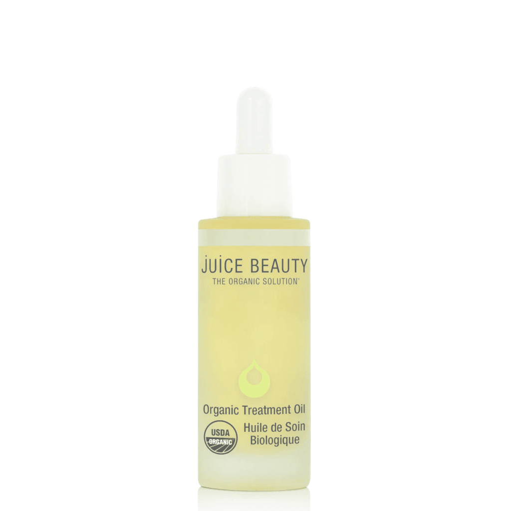 A bottle of JUICE BEAUTY THE ORGANIC SOLUTION organic treatment oil, a product that could be a potential contender for the best serum for sensitive skin.